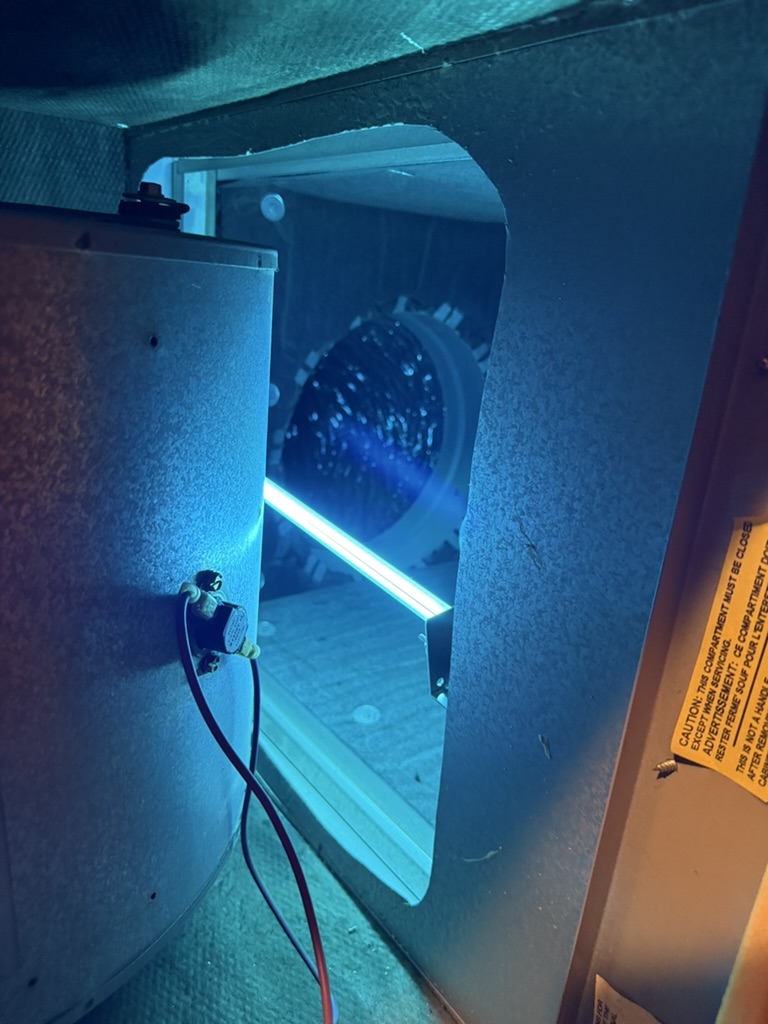 UV light installation inside HVAC system for air purification